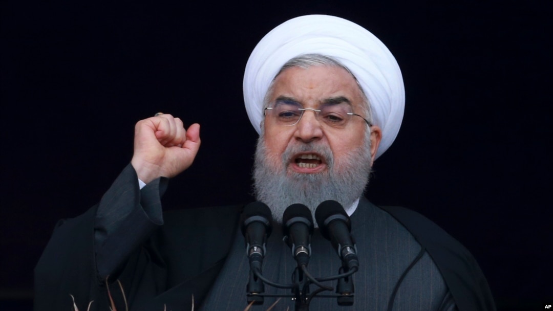 Iranian President Hassan Rouhani speaks during a ceremony celebrating the 40th anniversary of the Islamic Revolution, at the Azadi, Freedom, Square in Tehran, Feb. 11, 2019.