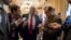 Reporters interview Sen. Mike Enzi, R-Wyo., chairman of the Senate Budget Committee, as arrives to meet with House Ways and Means Committee Chairman Kevin Brady, R-Texas, at the Capitol to advance the GOP tax bill, in Washington, Dec. 15, 2017.