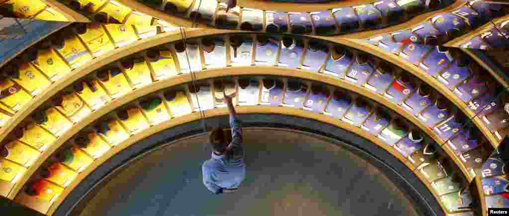 The jerseys of the national soccer teams of all FIFA&#39;s member countries are shown in the rainbow room at the future FIFA World Football Museum during a media preview in Zurich, Switzerland, Jan. 12, 2016. The FIFA World Football Museum will be open to the public on Feb. 28.