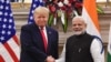 Perdana Menteri India Narendra Modi (kanan) menjabat tangan Presiden AS Donald Trump sebelum menggelar pertemuan di Hyderabad House di New Delhi, pada 25 Februari 2020. (Foto: AFP/Mandel Ngan)