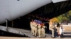 Fallen Australian Soldiers Return Home After Five Decades