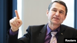 FIFA head of security Ralf Mutschke gestures during an interview with journalists at the Home of FIFA in Zurich, January 15, 2013.