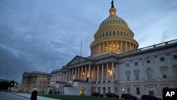 FILE - U.S. Capitol building in Washington at dusk.