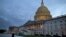 FILE - A view of the U.S. Capitol building is shown at dusk in Washington, October 2013.