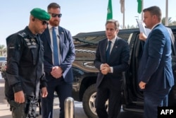 FILE - US Secretary of State Antony Blinken returns to his hotel in the Saudi capital Riyadh after meeting with Saudi Crown Prince Mohammed bin Salman on October 15, 2023.