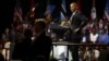 U.S. President Barack Obama playfully mimics the arms-akimbo stance of a young woman who asked a question during a town hall session at the Young African Leaders Initiative (YALI) Mandela Washington Fellowship Presidential Summit in Washington, Aug. 3, 20