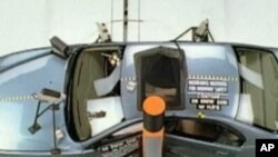 A passenger car during a side impact safety test