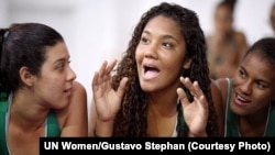 During the ‘One Win Leads to Another,’ sessions, the girls sit in circles exchanging ideas and opinions, and sharing intimate stories, at Olympic Vila of Mangueira, north of Rio de Janeiro, Brazil.