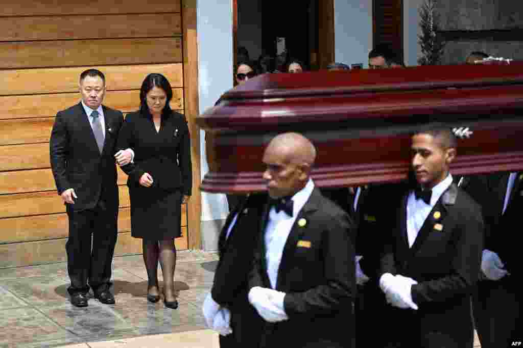 Employees from a funeral parlor carry the coffin of late Peru&#39;s former president Alberto Fujimori in front of Fujimori&#39;s children Kenji and Keiko, to take it to the Ministry of Culture for his wake in Lima.&nbsp;Fujimori, who ruled his country with an iron fist and then spent 16 years in prison for crimes against humanity, died on Sept. 11, 2024, at age 86 in the capital.&nbsp;