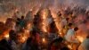 Hindu devotees observe Rakher Upabash in front of Shri Shri Lokenath Brahmachari Ashram temple in Narayangonj near Dhaka, Bangladesh.