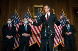 FILE - U.S. Senator John Thune, R-S.D., speaks during a news conference at the U.S. Capitol in Washington, Dec. 8, 2020.