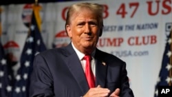 FILE - Republican presidential candidate former President Donald Trump on Wednesday, Oct. 11, 2023, at Palm Beach County Convention Center in West Palm Beach, Fla. A judge has rejected an attempt by Trump to dismiss a lawsuit seeking to keep him off the ballot in Colorado.