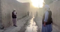 FILE - Smoke hovers at the site of an explosion as Afghan forces clash with Taliban fighters near Kunduz, Afghanistan, July 10, 2021, in this picture taken by Reuters from video.