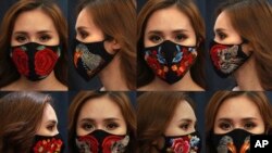 Combination photo shows a woman wearing designs of embroidery masks at a fashion studio in Hanoi