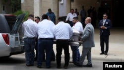Pallbearers carry the coffin of Amerie Jo Garza during the funeral service for one of the victims of the Robb Elementary school mass shooting that resulted in the deaths of 19 children and two teachers, in Uvalde, Texas, U.S., May 31, 2022. (REUTERS/Shannon Stapleton)