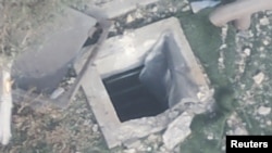 A view shows what the Israeli military says is an opening to Hamas underground infrastructure at Sheikh Hamad Hospital at a location given as Gaza in this still image taken from video released Nov. 5, 2023.