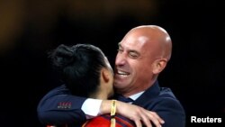 Spanish soccer federation president Luis Rubiales embraces Spain's Jenni Hermoso after Spain defeated England in the FIFA Women's Word Cup final in Sydney, Australia, on Aug. 20, 2023.