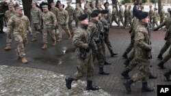 Ceremonia de bienvenida para las tropas estadounidenses en Zagan, Polonia.