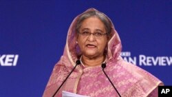 FILE - Bangladesh's Prime Minister Sheikh Hasina is seen delivering a speech during a visit to Tokyo, Japan.