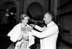 FILE - French actor Michel Piccoli talks with Swedish actress Liv Ullmann at the Cannes Film Festival, southern France, May 20, 1974.