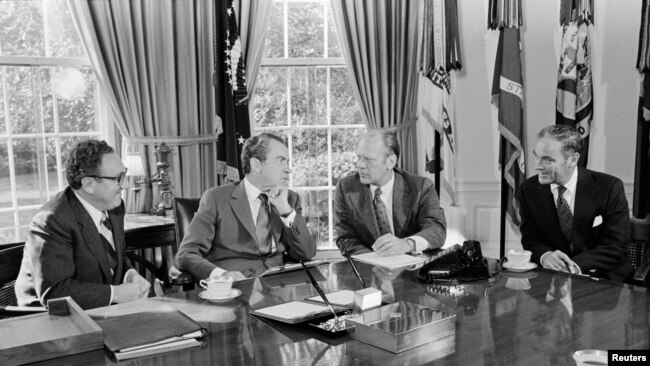 U.S. President Richard Nixon meets with Vice President-Designate Congressman Gerald Ford, Secretary of State Henry Kissinger, and Chief of Staff Alexander Haig, Jr., in the Oval Office, in Washington, U.S. October 13, 1973 Richard Nixon Presidential Library/Handout.
