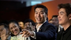 Thailand's Future Forward Party leader Thanathorn Juangroongruangkit, center, talks to reporters during a press conference at the party's headquarters in Bangkok, Jan. 21, 2020.