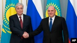 Президент Казахстана Касым-Жормат Токаев и премьер министр России Михаил Мишустин