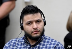 Jose Ibarra listens through an interpreter during his trial at Athens-Clarke County Superior Court, Nov. 20, 2024, in Athens, Ga. (Hyosub Shin/Atlanta Journal-Constitution via AP)