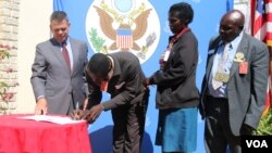 Ambassador Bruce Wharton with some of the beneficiaries. (Photo: Mavis Gama)