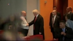 Crowd Reacts as Trump Leaves NY Times Meeting