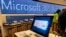 FILE - In this Jan. 28, 2020 file photo a Microsoft computer is among items displayed at a Microsoft store in suburban Boston.