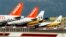 FILE - EasyJet planes are seen standing on the tarmac of Britain's Luton Airport.