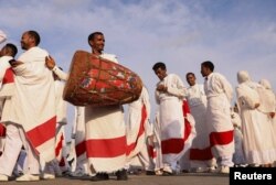 FILE - Members of the Ethiopian Orthodox choir perform during the Meskel festival celebration to commemorate the discovery of the True Cross on which Jesus Christ was crucified, in Addis Ababa, Ethiopia, September 27, 2023.