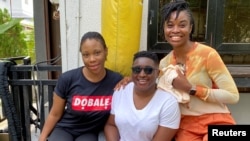 Producer of the movie "Ife" Pamela Adie poses with the two casts, Uzoamaka Aniunoh and Cindy Amadi in Lagos, Nigeria, Aug. 10, 2020. 