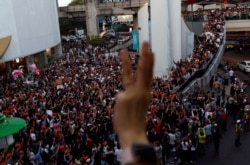 FILE - Supporters react at a sudden, unauthorized rally by the progressive Future Forward Party in Bangkok, Thailand, Dec. 14, 2019.