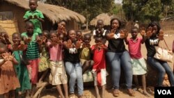 FILE: Girls in central Malawi protest child abuse and early marriage. (L. Masina/VOA)