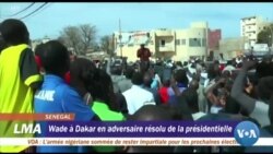 Wade à Dakar en adversaire résolu de la présidentielle