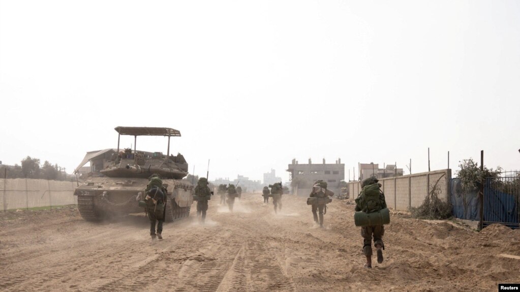 Israeli soldiers operate in the Gaza Strip(photo:VOA)