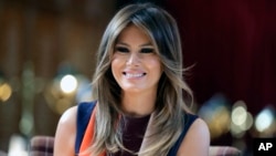 FILE - First lady Melania Trump visits The Royal Hospital Chelsea in central London, July 13, 2018.