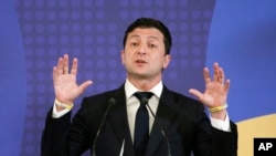 FILE - Ukrainian President Volodymyr Zelenskiy speaks during an EU-Ukraine summit press conference in Kyiv, July 8, 2019.