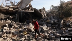 Aftermath of an Israeli strike on a house in Nuseirat, central Gaza Strip