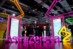 An AstraZeneca sign is seen at the third China International Import Expo (CIIE) in Shanghai, Nov. 6, 2020.