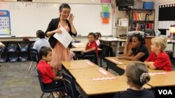 A Mandarin teacher guides students through a language lesson, Macon, Georgia, October 2012. (Courtesy of Bibb County School District)