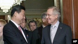 15일 미 상원 지도자들과 만난 시진핑 중국 국가부주석(왼쪽)