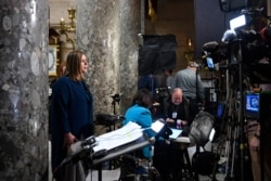 FILE - Democratic Congresswoman Elissa Slotkin speaks during a television interview on Capitol Hill in Washington, Dec. 18, 2019.