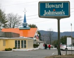 In this April 8, 2015 photo, customers walk into Howard Johnson's Restaurant in Lake George, New York.