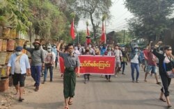 Anti-coup protesters march in Mandalay, Myanmar, April 10, 2021. (Credit: Citizen journalist via VOA Burmese Service)