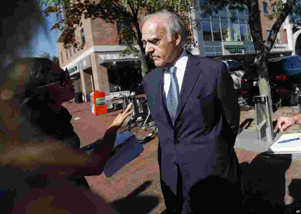 GlobalPost President and CEO Philip Balboni talks with reportes during a news conference in Boston, Aug. 20, 2014.