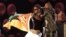 U.S. superstar, Sean "P Diddy" Combs, left, was joined by South African Kwaito musician Mandoza at a concert in Cape Town South Africa, November 23, 2002.