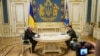 FILE - U.S. Special Envoy for Ukraine and Russia Keith Kellogg, left, and Ukraine's President Volodymyr Zelenskyy talk during their meeting in Kyiv, Feb. 20, 2025.